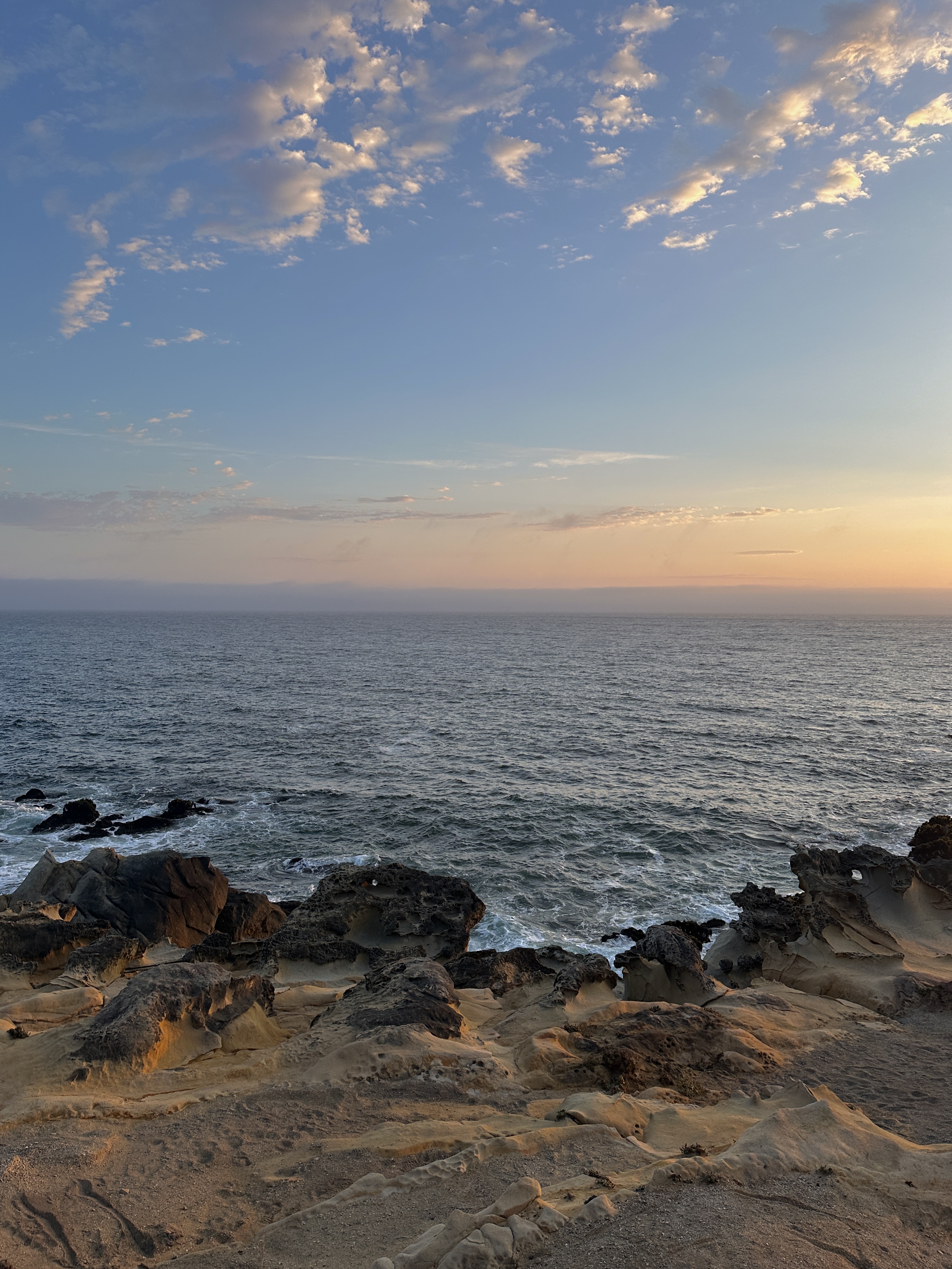Rocky shoreline at golden hour